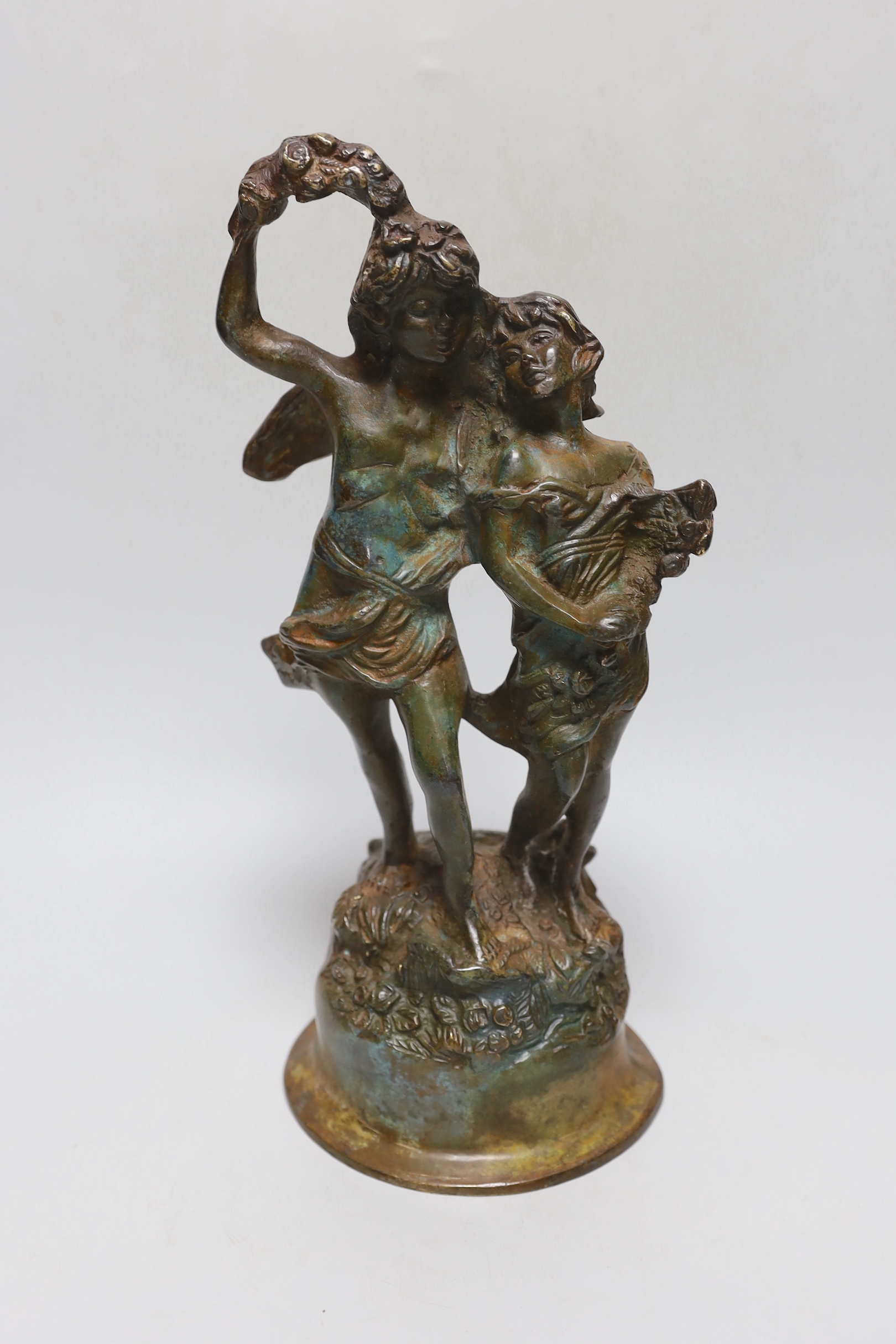 A bronze figure group, 33cm tall